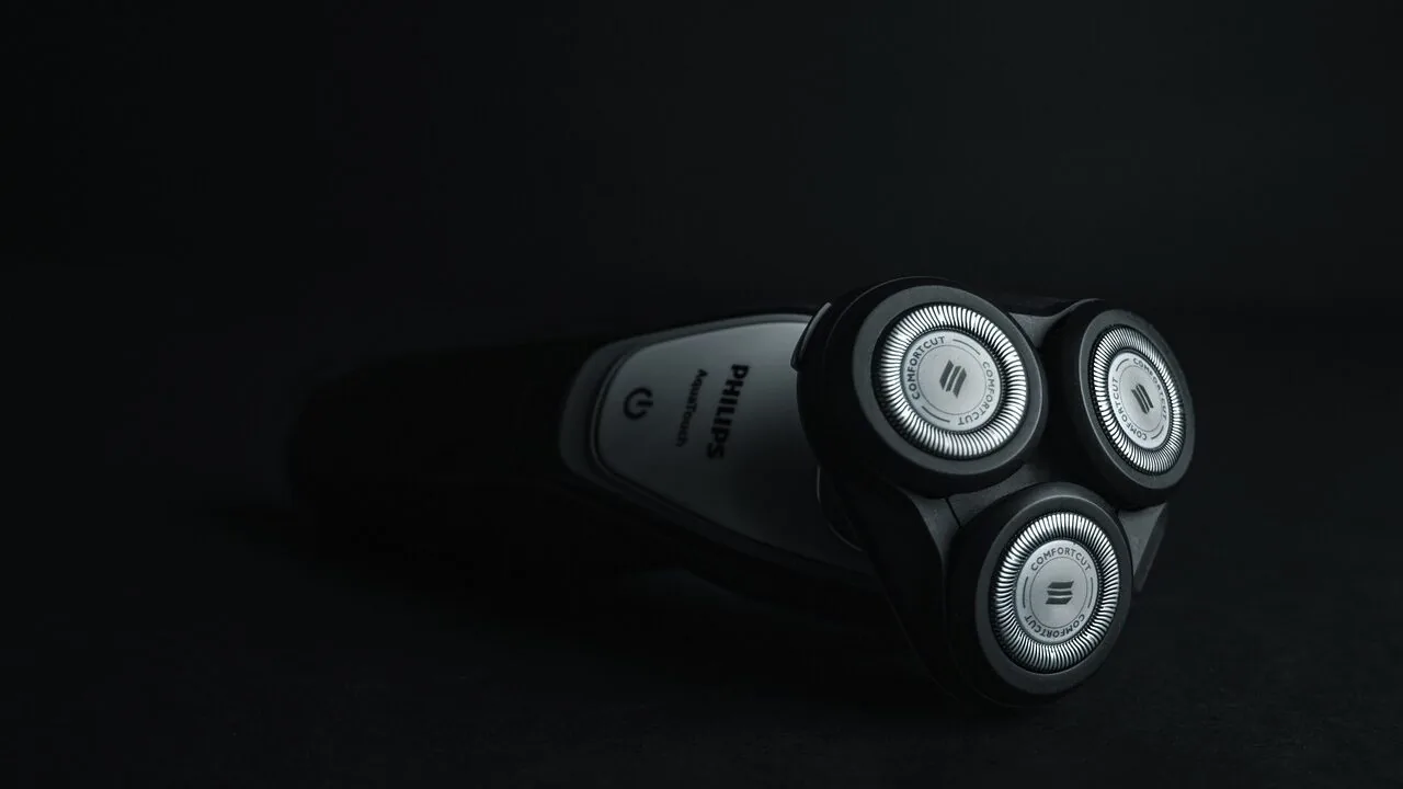 Electric shaver displayed on bathroom counter with natural light
